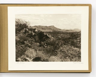 An album of 25 bromoil prints of Central Australia, individually captioned and signed by the photographer