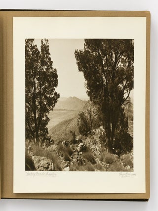 An album of 25 bromoil prints of Central Australia, individually captioned and signed by the photographer