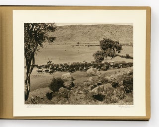 An album of 25 bromoil prints of Central Australia, individually captioned and signed by the photographer