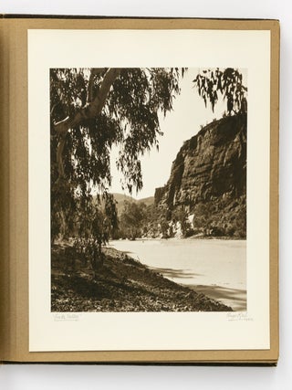 An album of 25 bromoil prints of Central Australia, individually captioned and signed by the photographer