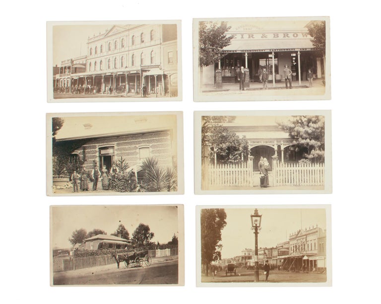 Item #86915 A group of six 1870s-80s photographs of Sandhurst (Bendigo), Victoria. They are all vintage outdoor cartes de visite mounted on individual cards with the photographers' details printed on the verso of four of them (Chevalier, Pall Mall, Sandhurst on one; R. Dermer Smith, Landscape and Architectural Photographer, Bull St, Sandhurst on three, one of which is dated by hand 'Nov 1883'). Davies and Stanbury record Thomas Chevalier at this address from 1865-68; they list Smith at '20 Bull Street, Bendigo' in 1898-1900, so you can amend your copy accordingly. The two uncredited images are very interesting streetscapes (featuring Pall Mall, and the Bee-Hive Stores and environs); one by Smith shows the well-stocked facade of Weir & Brown, established 1857, 'Groceries, Ironmongery, Earthenware and Drapery'; the other three depict a variety of citizens of some substance outside their residences. The photographs and their mounts are in uniformly fine condition. Sandhurst, Bendigo.