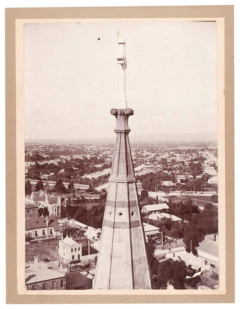 Item #96068 An unusual and striking photograph from the front western spire of St Peter's Cathedral, Adelaide, looking east towards the hills, with the top portion of the eastern spire the dramatic focus of the image. Adelaide St Peter's Cathedral.