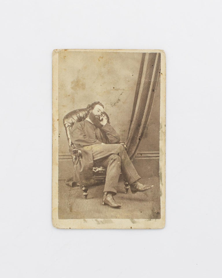 Item #97372 A carte de visite self-portrait, depicting the photographer 'dozing' peacefully in a high-backed padded armchair. Bernard GOODE.